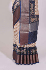 Cream geometric checked motifs chanderi cotton saree with contrast zari border and printed blouse