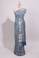 Cream floral design chanderi cotton saree with contrast border and printed blouse