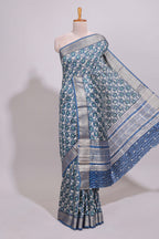 Cream floral design chanderi cotton saree with contrast border and printed blouse