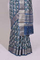 Cream floral design chanderi cotton saree with contrast border and printed blouse
