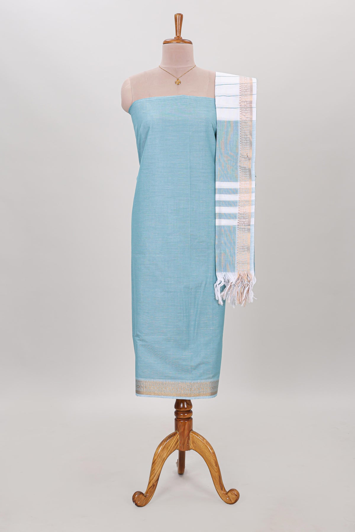 Blue plain cotton chudidhar material with contrast solid pant and matching striped dupatta