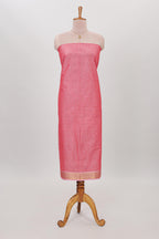 Peach plain cotton chudidhar material with contrast solid pant and matching striped dupatta