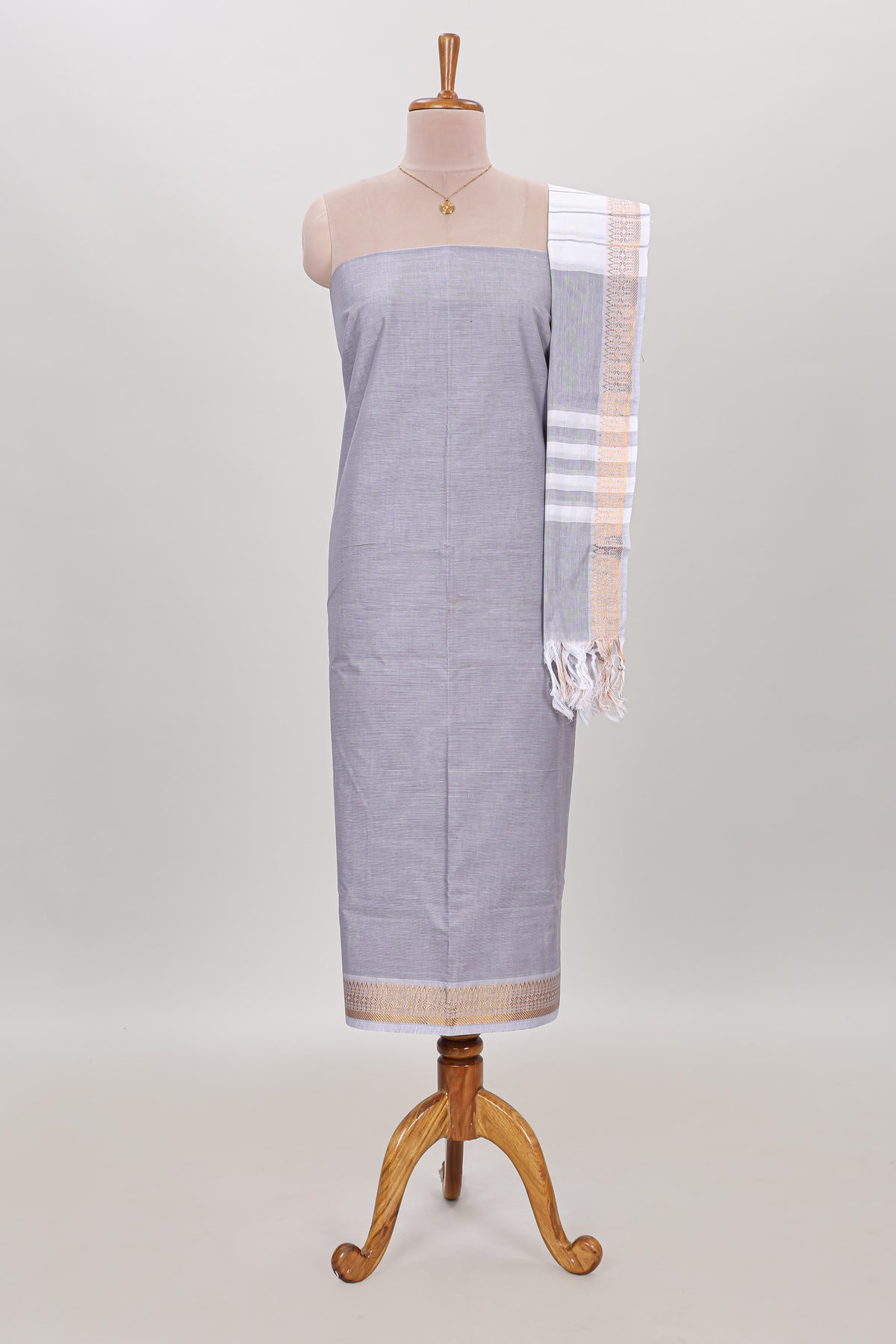 Grey plain cotton chudidhar material with matching solid pant and striped dupatta
