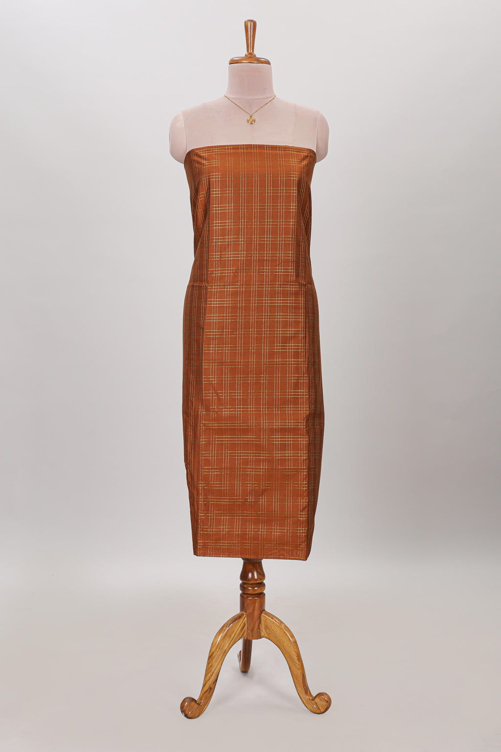 Orange checked cotton chudidhar material with matching solid pant and contrast floral dupatta
