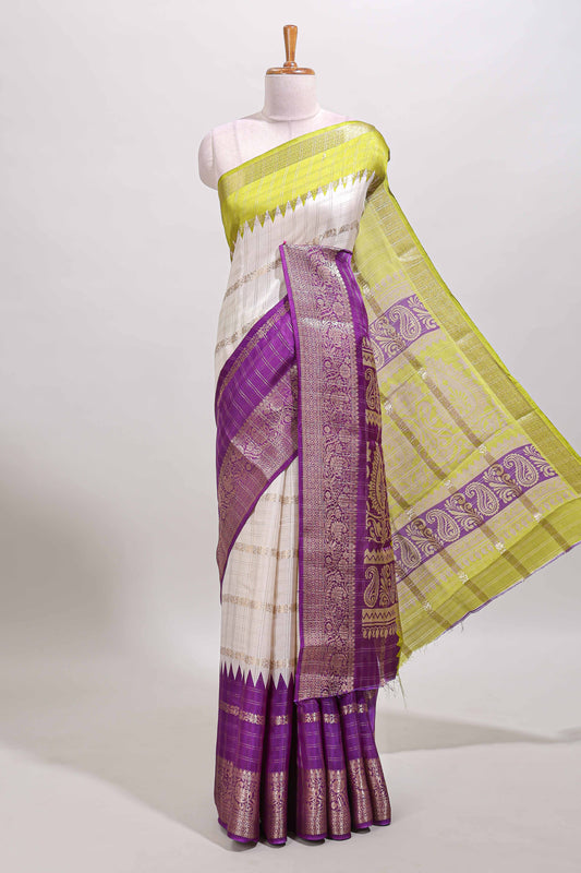 Multi color checked dola silk saree with contrast zari border and printed pallu