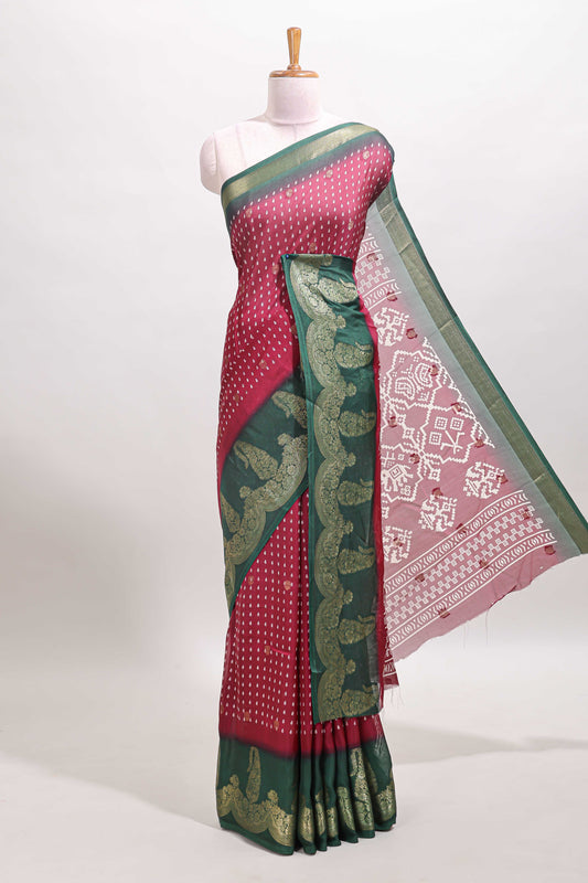 Maroon floral design zari butta dola silk saree with contrast floral zari design border and ikkat style pallu