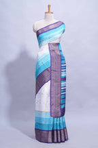 White and Aqua Blue Dola Silk Saree with rich zari border woven butis and a designer pallu along with contrast blouse
