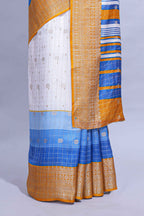 White and blue Dola Silk Saree with rich zari border woven butis and a designer pallu along with contrast blouse