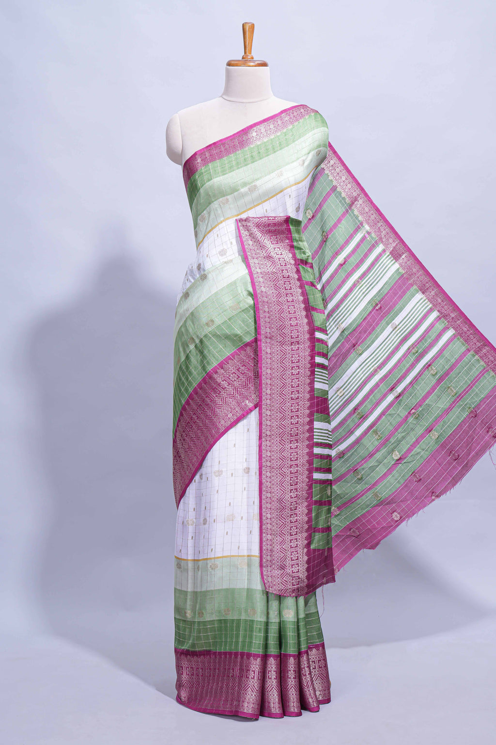 White and green Dola Silk Saree with rich zari border woven butis and a designer pallu along with contrast blouse