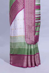 White and green Dola Silk Saree with rich zari border woven butis and a designer pallu along with contrast blouse