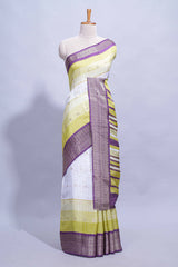 White and yellow Dola Silk Saree with rich zari border woven butis and a designer pallu along with contrast blouse