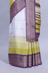 White and yellow Dola Silk Saree with rich zari border woven butis and a designer pallu along with contrast blouse