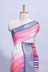 White and pink Dola Silk Saree with rich zari border woven butis and a designer pallu along with contrast blouse
