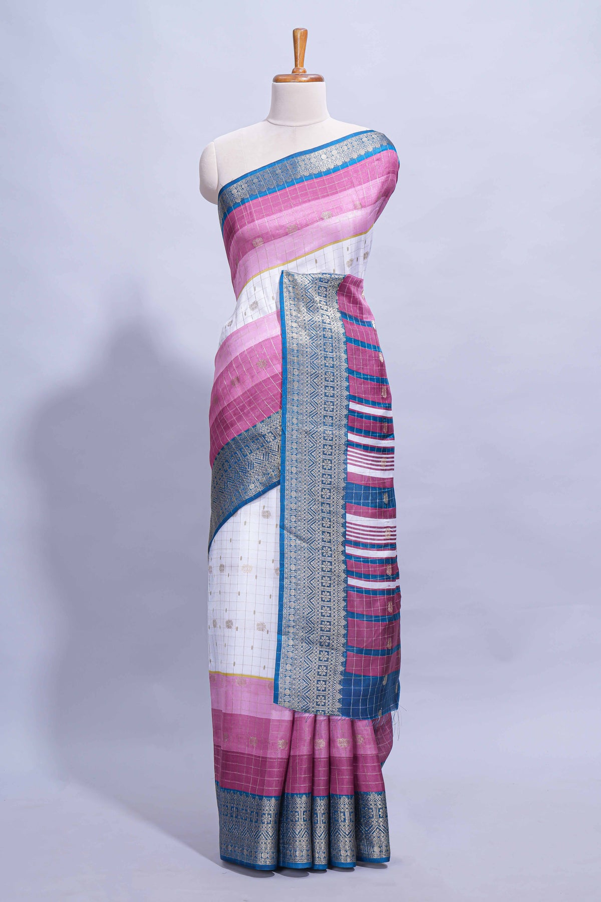 White and violet Dola Silk Saree with rich zari border woven butis and a designer pallu along with contrast blouse