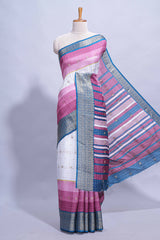 White and violet Dola Silk Saree with rich zari border woven butis and a designer pallu along with contrast blouse