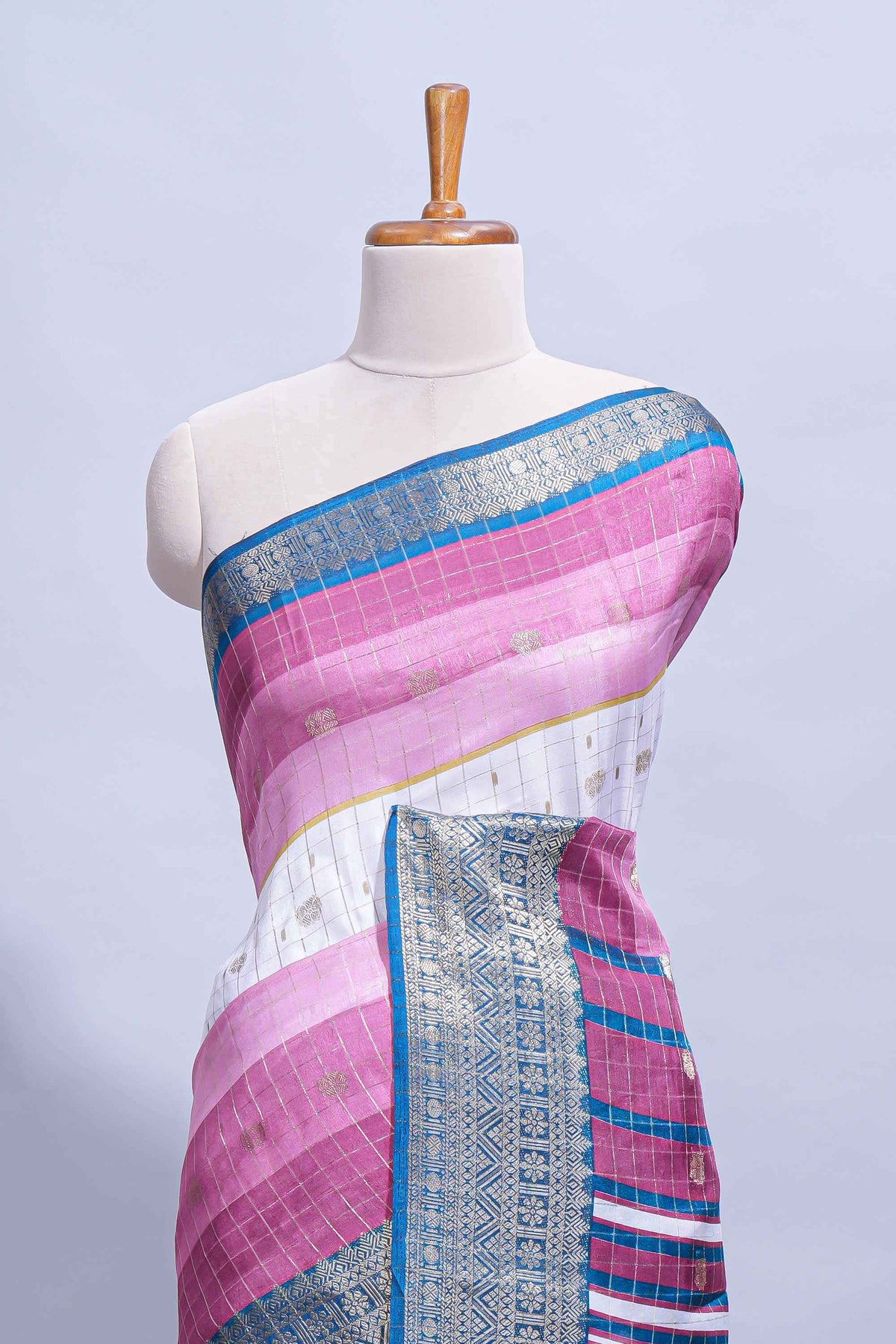 White and violet Dola Silk Saree with rich zari border woven butis and a designer pallu along with contrast blouse