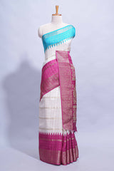 White Dola Silk Saree with aqua blue and magenta zari borders elegant woven checks and a rich designer pallu along with contrast blouse