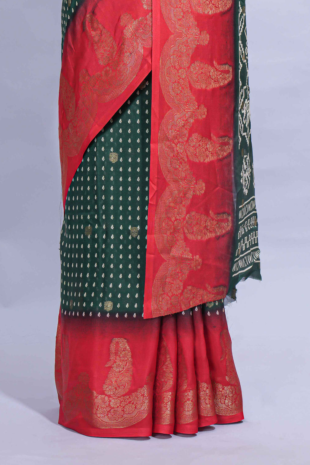 Dark Green Dola Silk Saree with elegant zari butis a rich zari border woven designer pallu along with matcing blouse