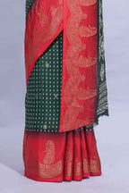 Dark Green Dola Silk Saree with elegant zari butis a rich zari border woven designer pallu along with matcing blouse