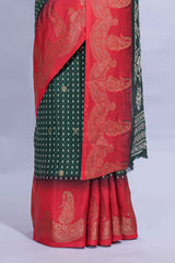 Dark Green Dola Silk Saree with elegant zari butis a rich zari border woven designer pallu along with matcing blouse