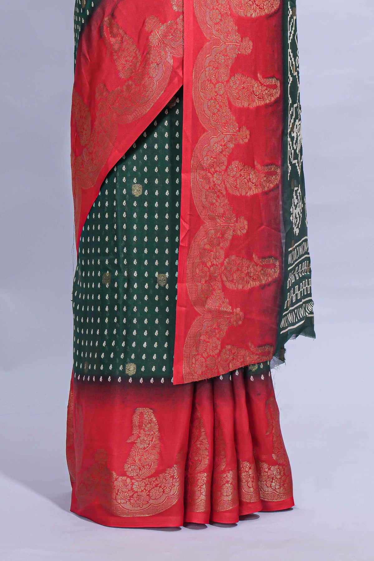 Dark Green Dola Silk Saree with elegant zari butis a rich zari border woven designer pallu along with matcing blouse