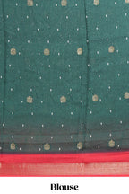 Dark Green Dola Silk Saree with elegant zari butis a rich zari border woven designer pallu along with matcing blouse