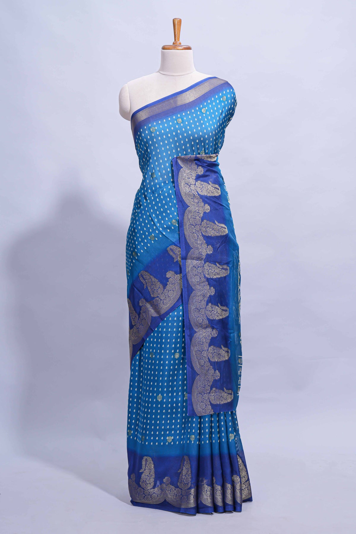Dark blue Dola Silk Saree with elegant zari butis a rich zari border woven designer pallu along with matcing blouse