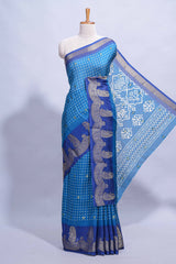 Dark blue Dola Silk Saree with elegant zari butis a rich zari border woven designer pallu along with matcing blouse