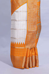 White Dola Silk Saree with orange and green zari borders elegant woven checks and a rich designer pallu along with contrast blouse