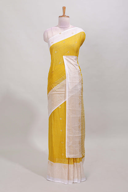 Yellow striped zari butta dola silk saree with contrast zari border and matching blouse