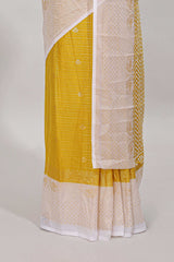Yellow striped zari butta dola silk saree with contrast zari border and matching blouse