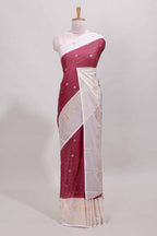 Maroon zari striped dola silk saree with contrast zari border and blouse
