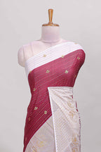 Maroon zari striped dola silk saree with contrast zari border and blouse