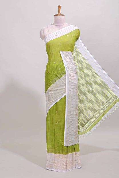 Green zari striped dola silk saree with contrast zari border and blouse