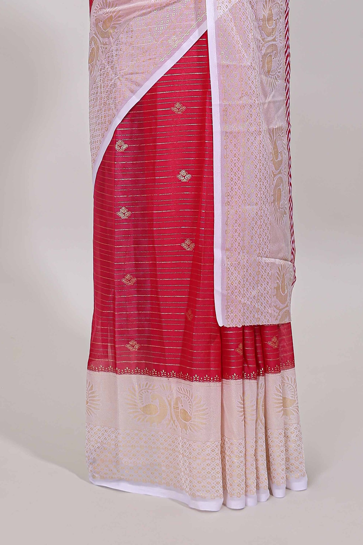 Pink zari striped dola silk saree with contrast zari border and blouse