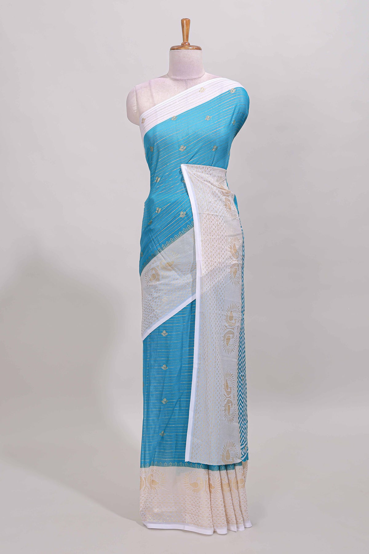 Ice blue zari striped dola silk saree with contrast zari border and blouse