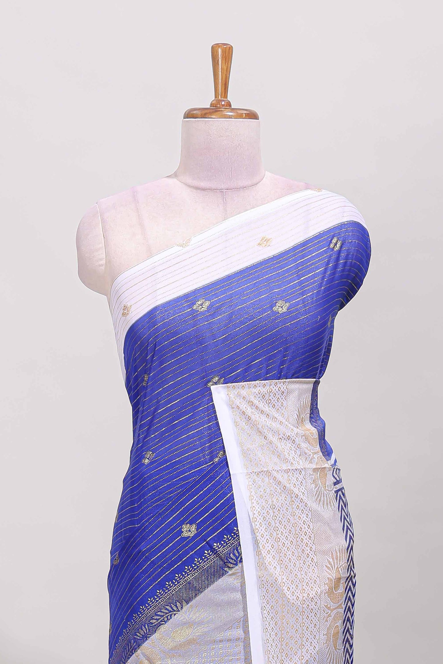Royal blue zari striped dola silk saree with contrast zari border and blouse
