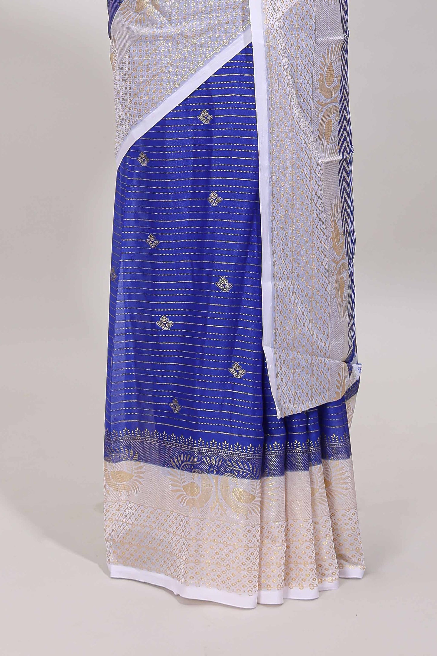 Royal blue zari striped dola silk saree with contrast zari border and blouse