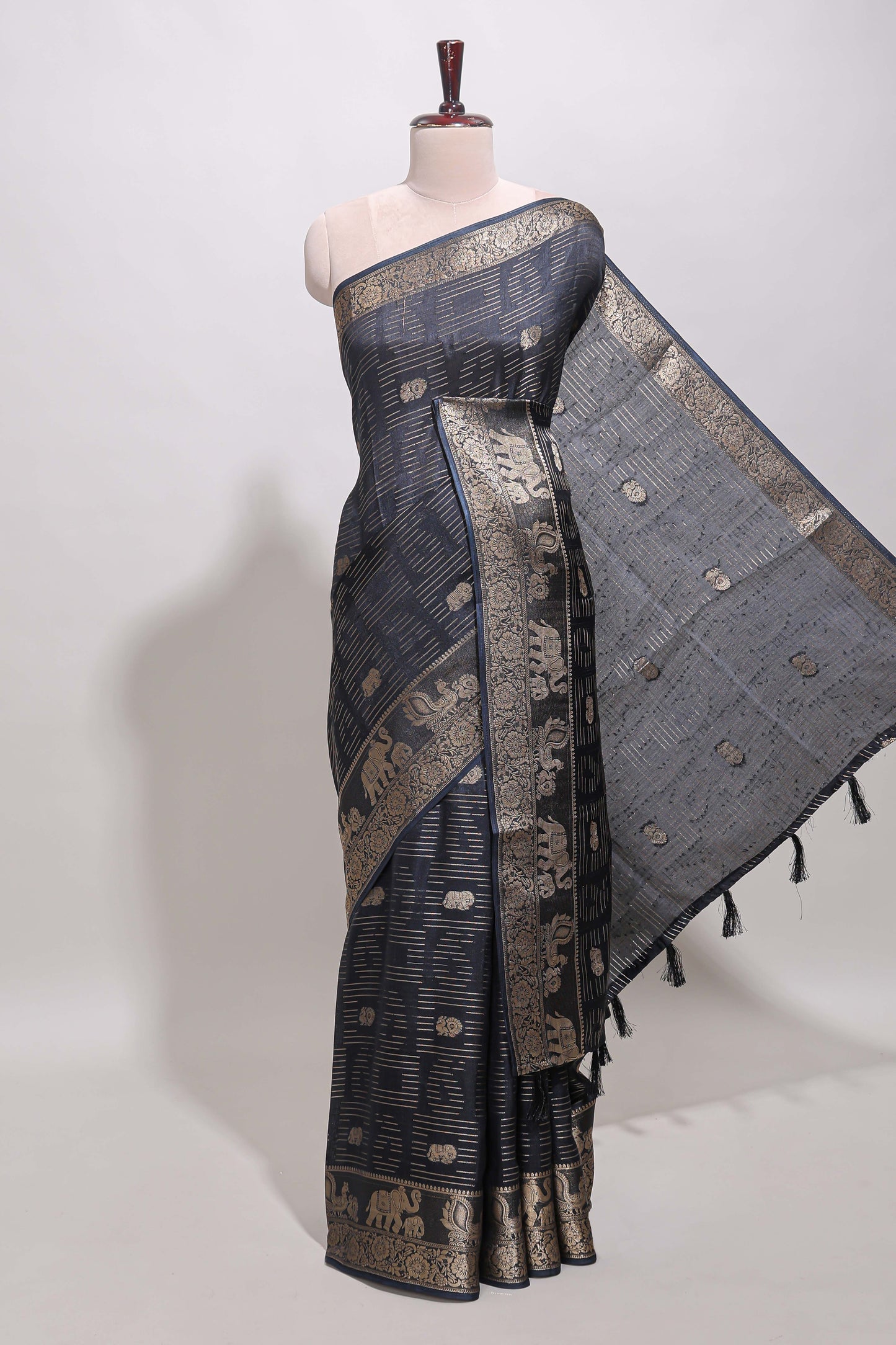 Deep navy blue zari butta dola silk saree with self zari border and printed pallu