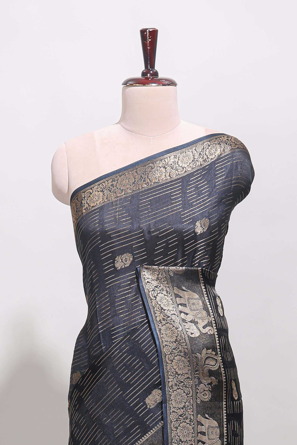 Deep navy blue zari butta dola silk saree with self zari border and printed pallu