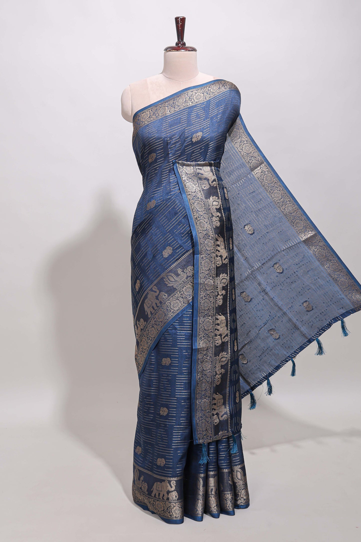 Midnight blue zari butta dola silk saree with self zari border and printed pallu