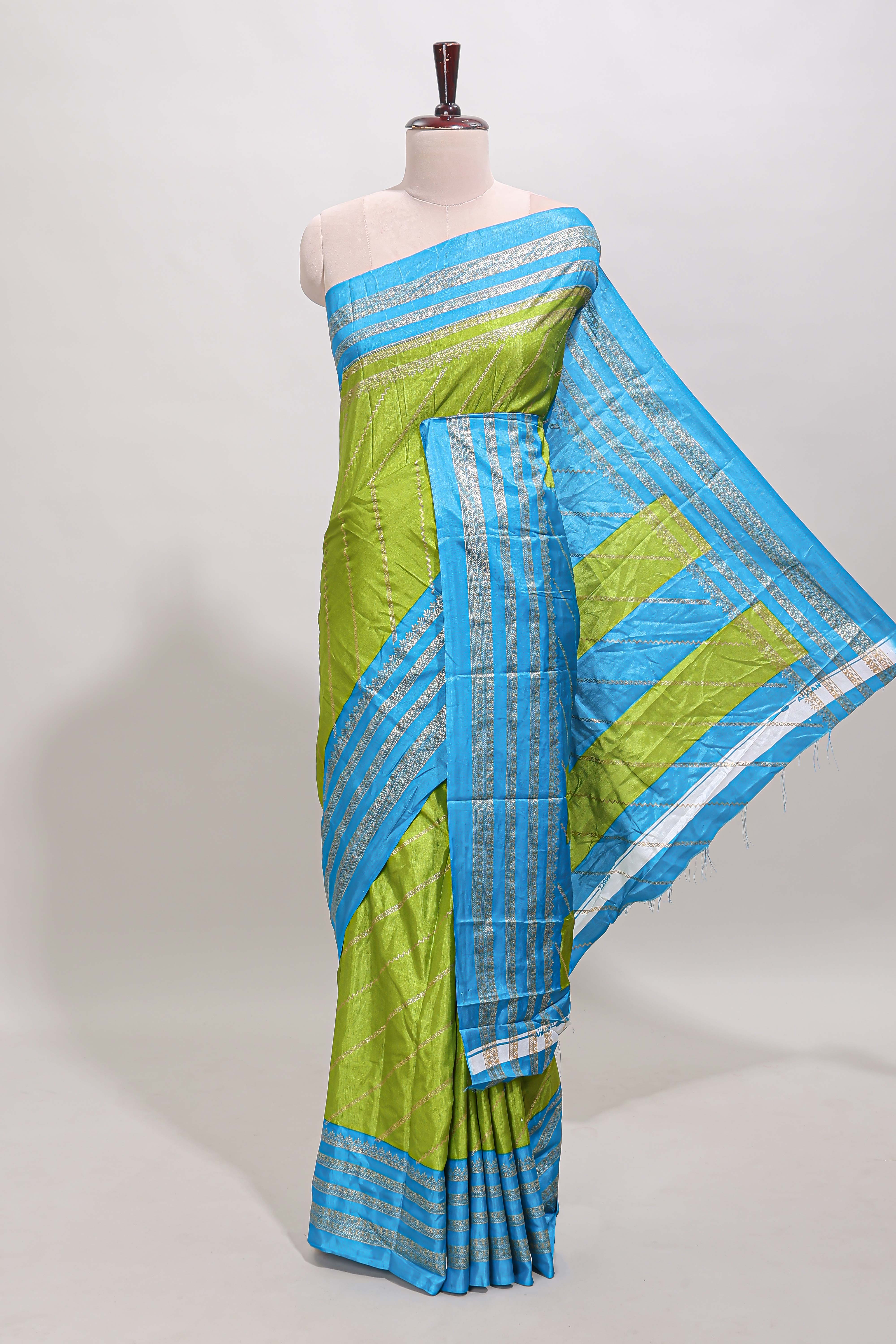 Lime green zari striped saree in dola silk with contrast woven border and blouse