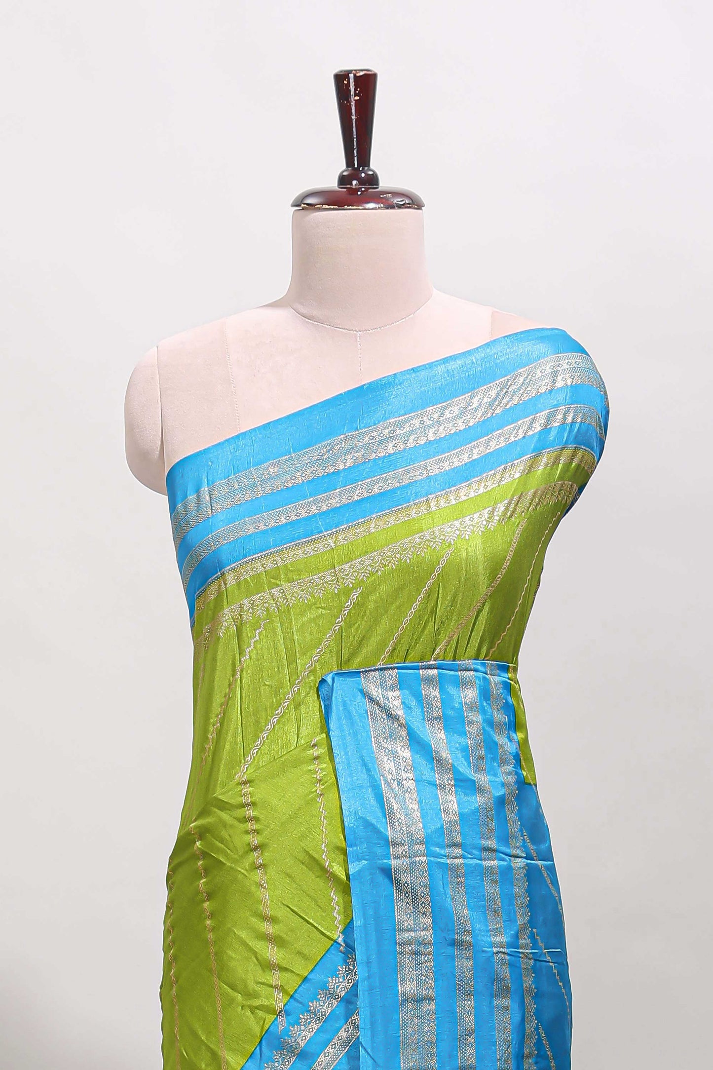 Lime green zari striped saree in dola silk with contrast woven border and blouse