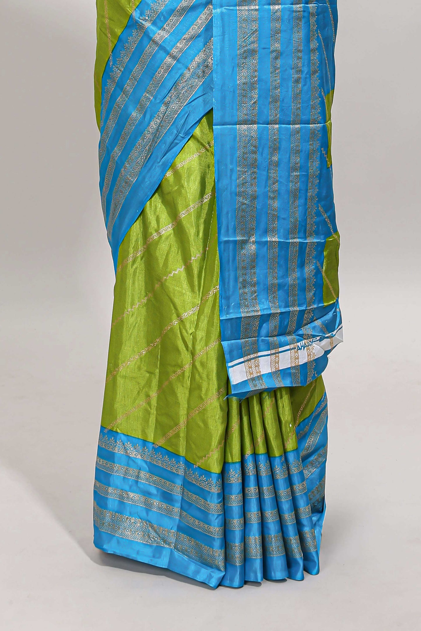 Lime green zari striped saree in dola silk with contrast woven border and blouse