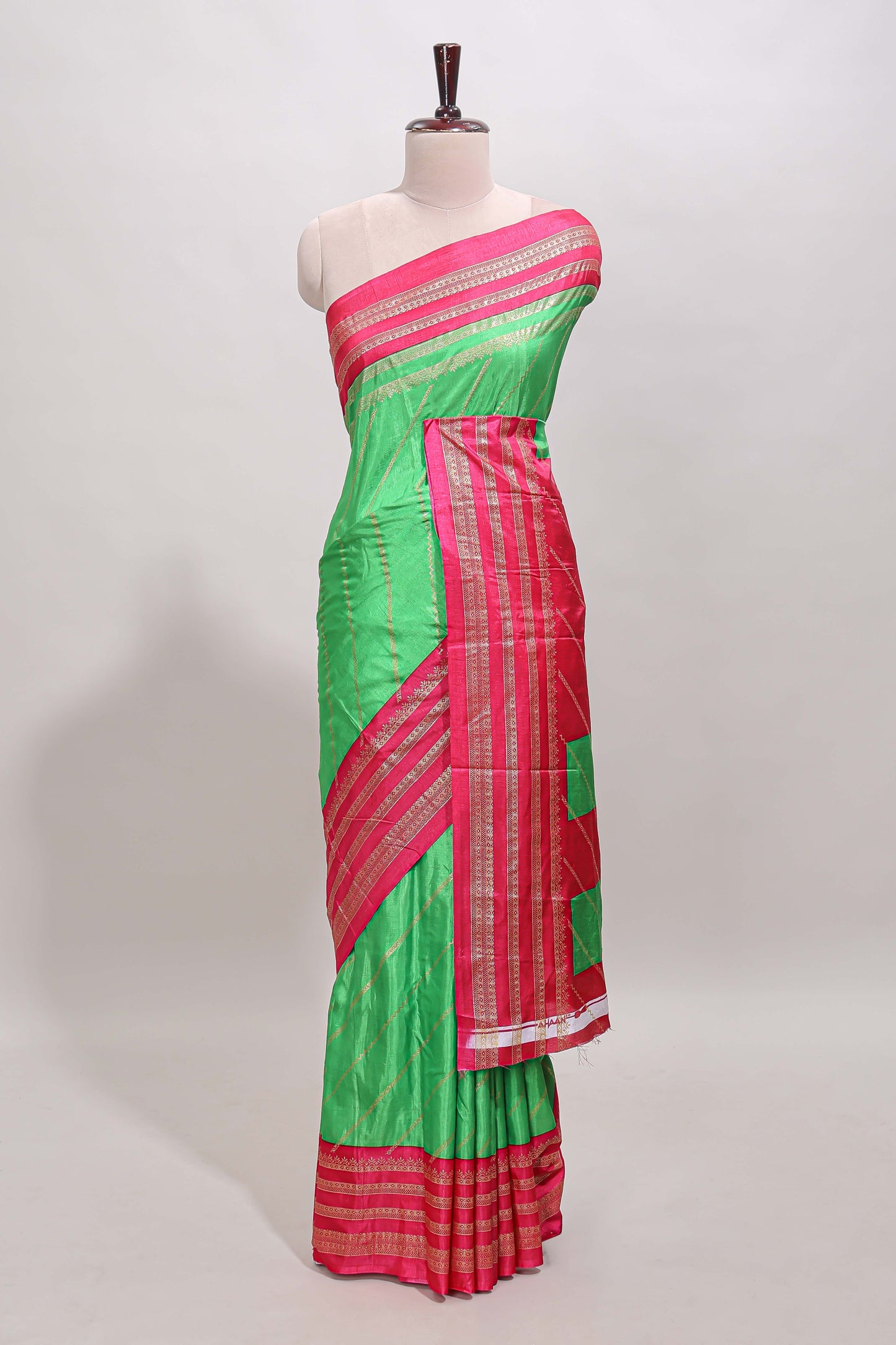 Neon green zari striped saree in dola silk with contrast woven border and blouse