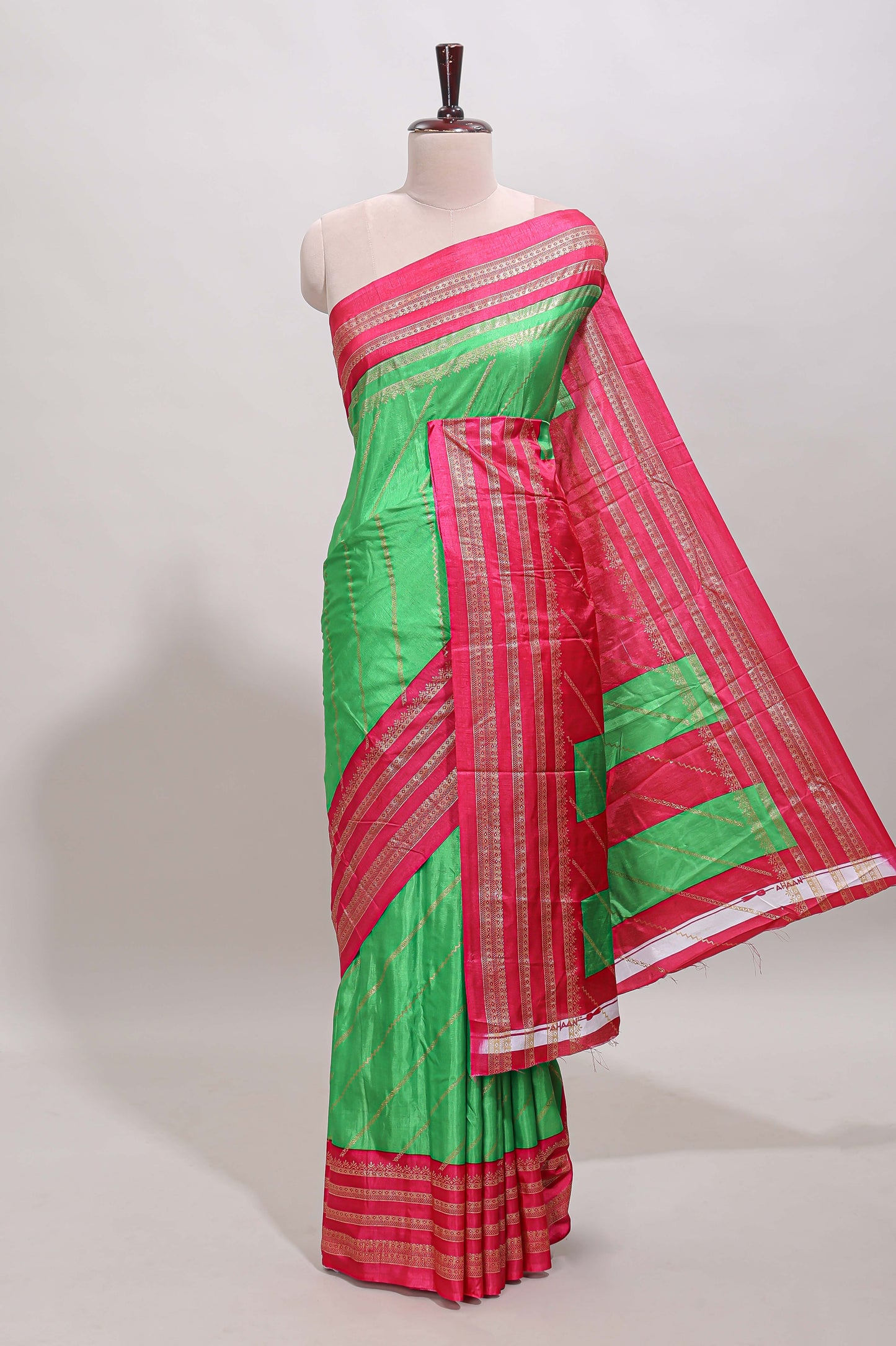 Neon green zari striped saree in dola silk with contrast woven border and blouse