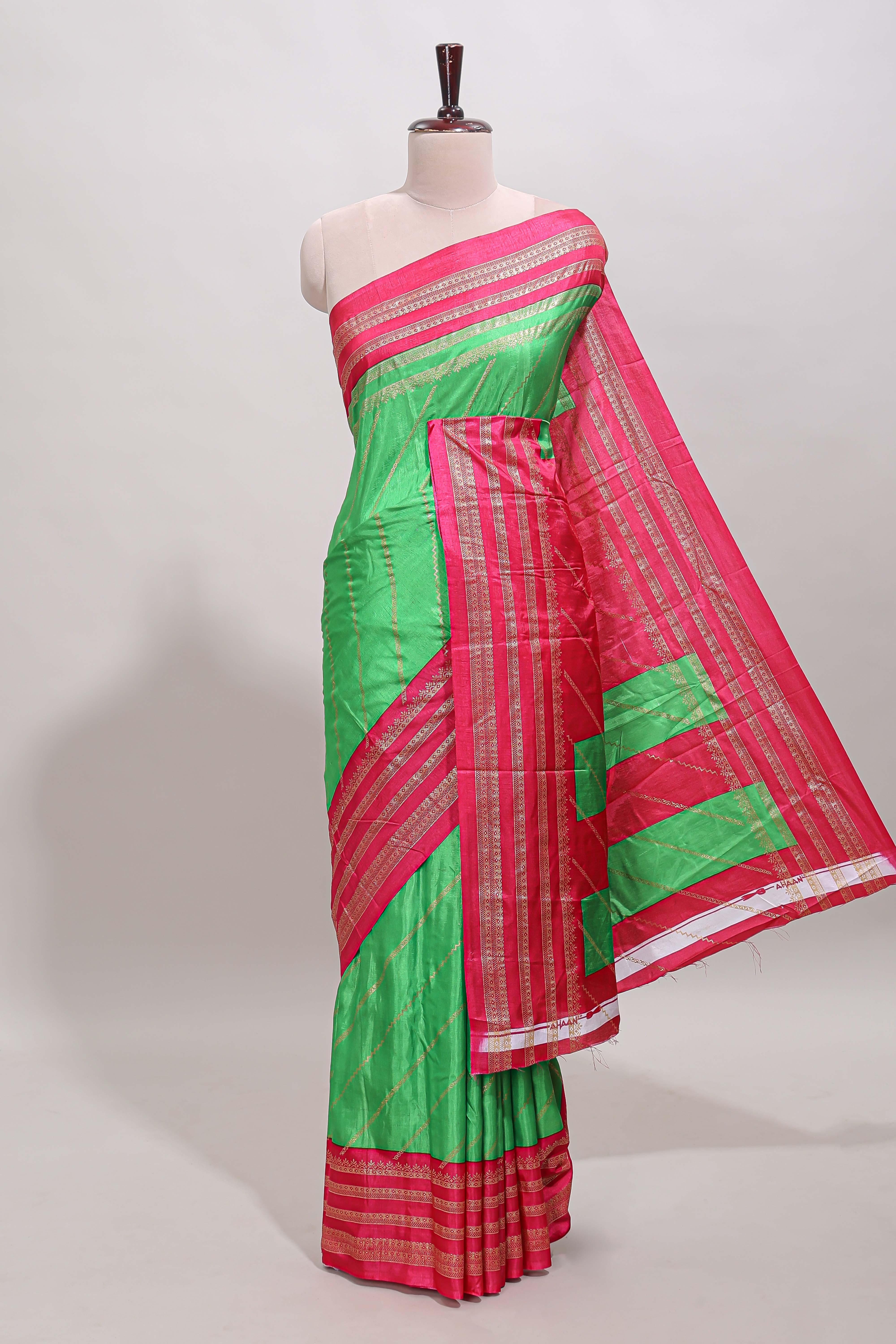 Neon green zari striped saree in dola silk with contrast woven border and blouse