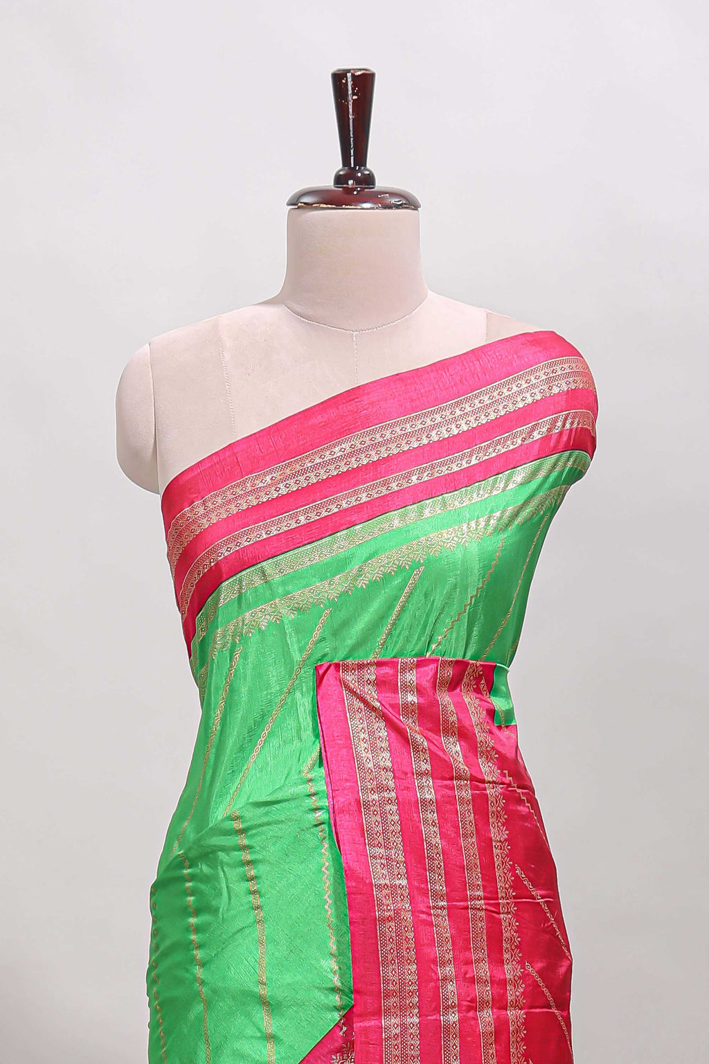 Neon green zari striped saree in dola silk with contrast woven border and blouse