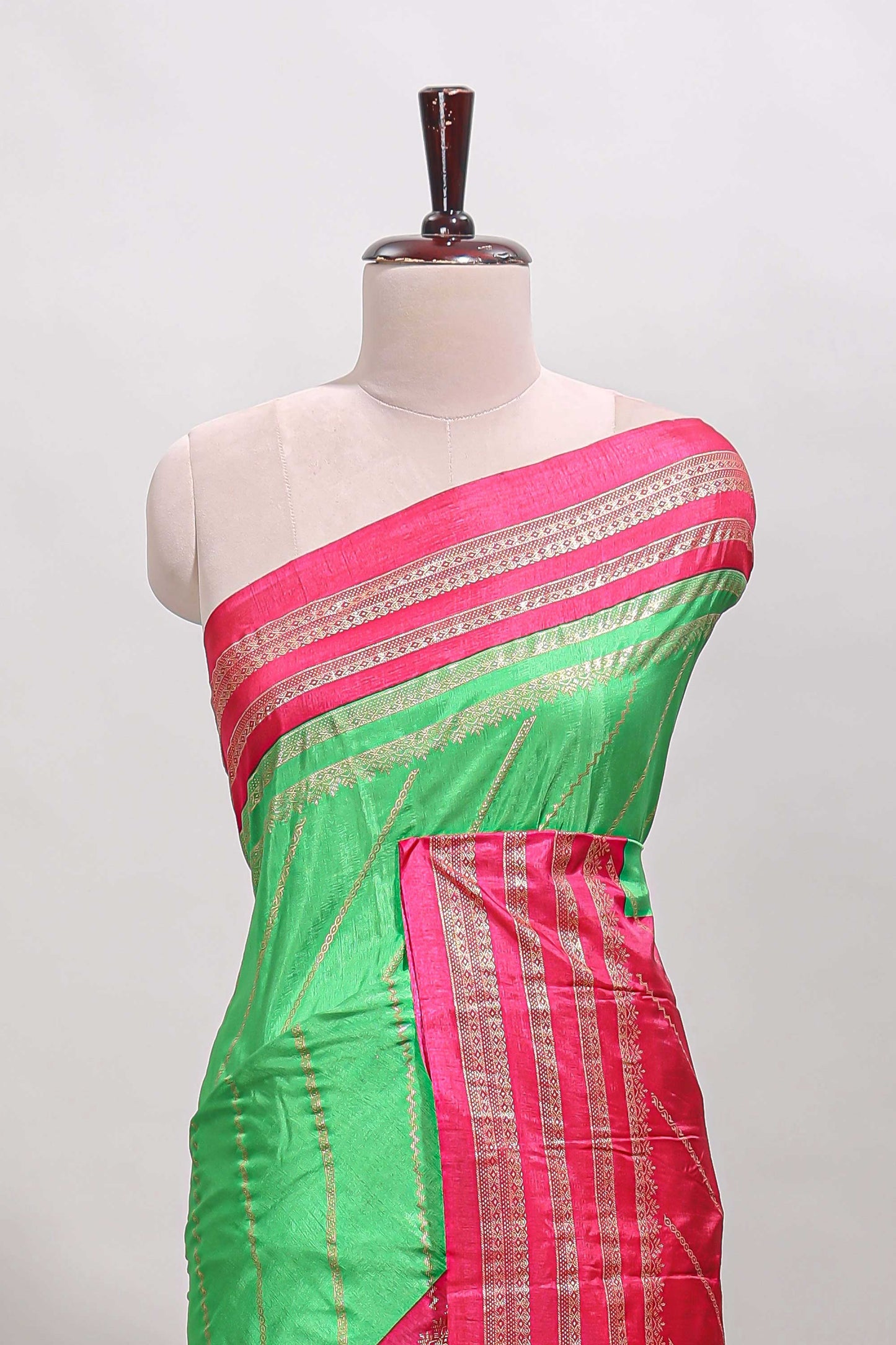 Neon green zari striped saree in dola silk with contrast woven border and blouse