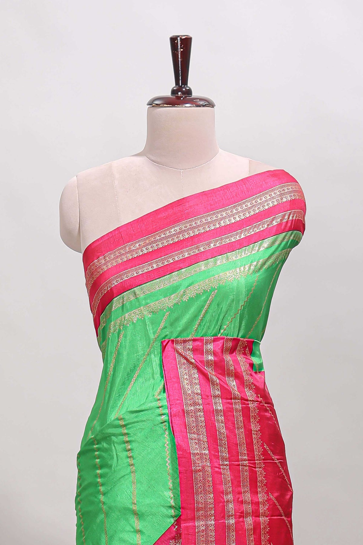 Neon green zari striped saree in dola silk with contrast woven border and blouse